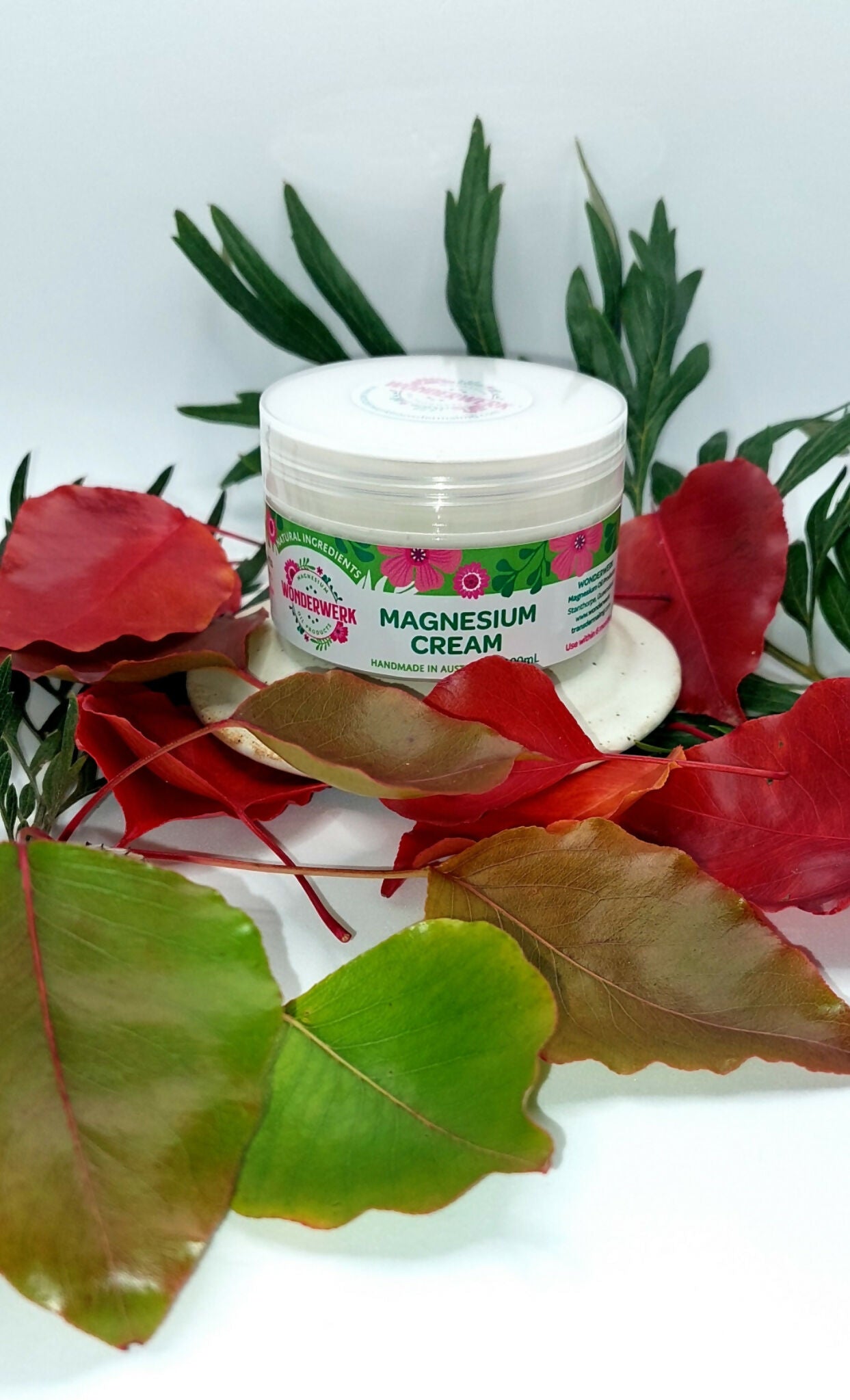 Wonderwerk Magnesium Cream 100ml jar with rose display