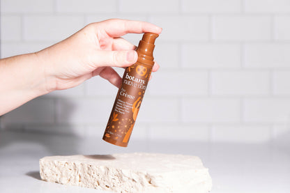 Applying Native Flora Day Crème Australian moisturiser skincare product