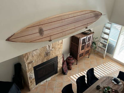 Riley Solid Balsa Classic Malibu surfboard displayed indoors showing timber construction