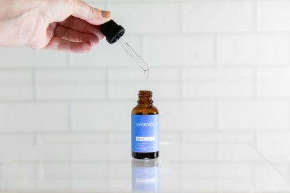 DNA Serum Hydrate dropper application showing Australian hydrating skincare serum with hyaluronic acid formula