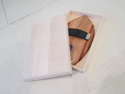 Riley solid balsa bodysurfing handboard presented with its balsa storage box
