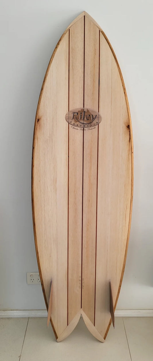Full front view of a Riley foam core balsa Fish surfboard with swallow tail