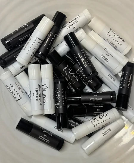 Moo Organics Tallow Lip Balm in unscented and peppermint varieties