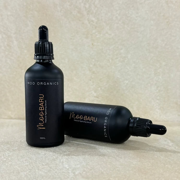 Moo Organics MOO BARU Hydrating Tallow Serum bottles with natural skincare packaging