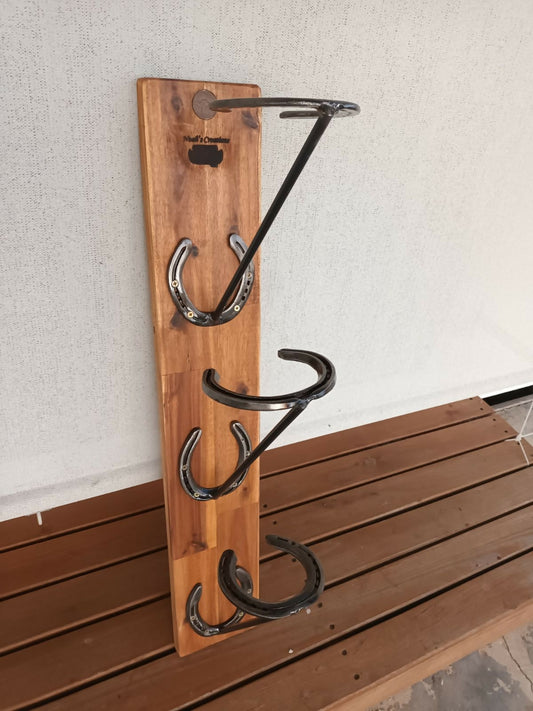 Handmade timber Akubra three-hat rack with repurposed horseshoe holders by Noah's Creations.